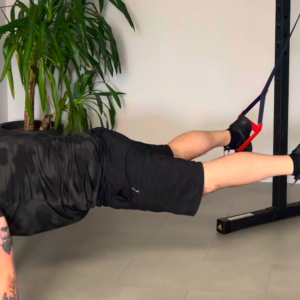 Gainage jambes écartées TRX