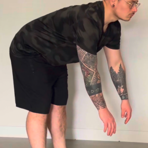 Demie flexion avant debout